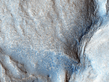 На снимке изображен участок Ацидалийской равнины - преимущественно равнинного района к северу от марсианского экватора