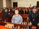 В Китае 27 чиновников, из-за которых казнили невиновного в убийстве юношу, отделались штрафами