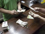 Из-за гиперинфляции в Венесуэле не хватает наличных, банкноты везут десятками самолетов