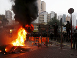 В ночь на вторник, 9 февраля, в Гонконге пострадали десятки человек в результате беспорядков в густонаселенном районе Монгкок на полуострове Коулун