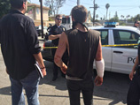 Полиция задержала 13 человек после серии стычек между членами расистской организации Ку-Клукс-Клан и их противниками на демонстрациях неподалеку от Диснейленда в штате Калифорния