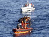 Береговая охрана Турции встречает мигрантов в Эгейском море, 28 февраля 2016 года