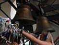 Полуголые девушки из Femen взобрались на колокольню Софийского сбора в Киеве Полуголые девушки из Femen взобрались на колокольню Софийского сбора в Киеве