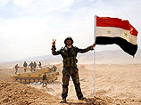 Бойцы сирийской армии и отряды ополченцев преследуют отступающие банды террористов на западной окраине Пальмиры Бойцы сирийской армии и отряды ополченцев преследуют отступающие банды террористов на западной окраине Пальмиры