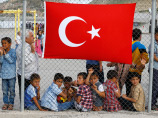 Туск назвал Турцию образцом для подражания в обращении с беженцами