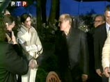 Слева - Лара Флинн-Бойл, справа- Владимир Путин