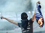 "Спартак" накажут за сжигание фанатами атрибутики "Динамо" "Спартак" накажут за сжигание фанатами атрибутики "Динамо"