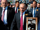 Одним из участников акции стал президент России Владимир Путин