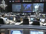 Два астронавта с челнока Discovery вышли в открытый космос