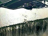 Накануне на северо-востоке страны воды крупнейшей итальянской реки По прорвали дамбы и обрушились на прилегающие населенные пункты