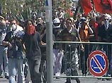 100 тысяч антиглобалистов прошли маршем по улицам Генуи