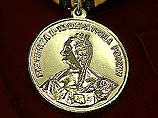 Международный конгресс российских немцев, открывшийся в Москве, наградил президента РФ Владимира Путина "Екатерининской" медалью