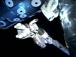 Россиянин и американец в открытом космосе Россиянин и американец в открытом космосе