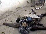 В западном Афганистане в районе авиабазы, расположенной рядом с городом Герат в пятницу найдено захоронение 12 человек, расстрелянных со связанными назад руками