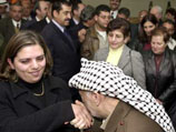 Ясир Арафат на встрече с христианами в своей резиденции в Рамаллахе