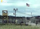 Пленных талибов перевозили на американскую базу на Кубе в масках Пленных талибов перевозили на американскую базу на Кубе в масках