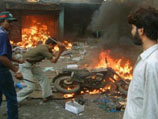 В кварталах Ахмадабада происходили поджоги и грабежи
