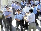 В Баку произошли столкновения между полицией и демонстрантами. Арестованы 35 человек