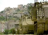 Израильские танки вошли в пятницу рано утром в палестинский город Дженин на Западном берегу реки Иордан