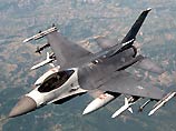 Одновременно истребитель F-16 израильской армии расстрелял соседнее трехэтажное здание, полностью разрушив его Одновременно истребитель F-16 израильской армии расстрелял соседнее трехэтажное здание, полностью разрушив его