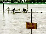 Наводнения и оползни, вызванные непрекращающимися проливными дождями на большей части территории Северной Кореи...