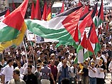Четыре человека погибли и более 30 ранены в ходе массовых выступлений палестинцев в поддержку Ясира Арафата