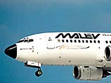 Представитель Malev заявил, что по телефону поступило сообщение о бомбе на борту самолета