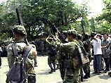 На Филиппинах боевики напали на поселок. 4 человека убиты, 22 взяты в заложники