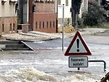 В Германии из-за проливных дождей вышли из берегов реки и ручьи Баварии В Германии из-за проливных дождей вышли из берегов реки и ручьи Баварии