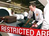 Новая система проверок багажа "введена во всех аэропортах США" в соответствии с законом об авиационной и транспортной безопасности от 12 февраля 2002 года