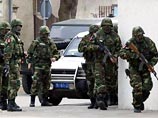 Усиленные отряды сербской полиции в пятницу взяли в оцепление и приступили к сносу дома одного из главарей Земунской преступной группировки Душана Спасоевича по кличке "Шиптар"