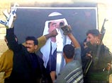 Иракские шииты в Багдаде заменили портрет Саддама Хусейна гигантским изображением Имама Хусейна Иракские шииты в Багдаде заменили портрет Саддама Хусейна гигантским изображением Имама Хусейна