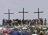 В Страстную пятницу на Филиппинах восемь мужчин и четыре женщины дали распять себя на кресте, чтобы пережить страдания Иисуса Христа