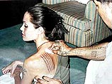 Анджелина Джоли сделала себе новую татуировку - тринадцатую