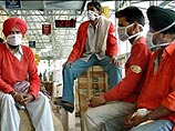 Страны Азии пытаются обуздать эпидемию атипичной пневмонии