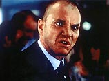 Малколм Макдауэлл часто исполнял роль злодеев. Кадр из фильма "Гангстер N1"