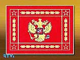 На лицевой стороне знамени будет изображен золотой двуглавый орел на красном полотнище. В правой лапе орла - скипетр, в левой - держава