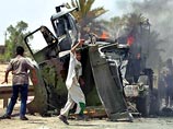Об этом сообщил катарский телеканал Al-Jazeera, который также показал горящий военный автомобиль, окруженный иракцами