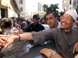 Аббаси Мадани и Али Бельхадж, освобожденные сегодня из тюрьмы, были арестованы в 1991 году и приговорены военным трибуналом к 12 годам заключения за 'деятельность, представляющую угрозу для безопасности государства'