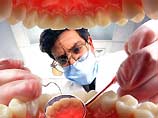 Дантист просверлил половину здоровых зубов у женщины, которая ему задолжала