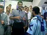 Жители Ирака празднуют смерть сыновей Саддама Хусейна Жители Ирака празднуют смерть сыновей Саддама Хусейна