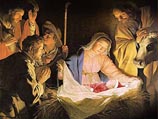 Младенца Христа нарядили в костюм Санта-Клауса - в благих целях