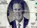 На купюре изображен портрет Джорджа Буша