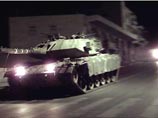 Израильская армейская колонна в составе 40 единиц бронетехники вошла сегодня вечером в центр города Рамаллах и Эль-Бира на Западном берегу реки Иордан