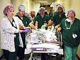 Сиамские близнецы из Египта, родившиеся со сросшимися макушками и разделенные в ходе "марафонской" операции врачами в Далласе (штат Техас), в четверг отключены от аппаратов искусственного дыхания