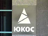 Акции НК "ЮКОС" упали на 5% после сообщения об аресте контрольного пакета акций компании