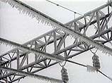 Снег налипает на линии электропередач, аварийные бригады компании "Сахалинэнерго" приведены в полную готовность к возможным порывам