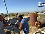 Многие "дикие" поселения на Западном берегу реки Иордан, на ликвидации которых настаивают США, в настоящее время находятся в стадии легализации