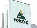Акционеры ЮКОСа" и "Сибнефти" достигли соглашения, что компании возвращаются на позиции, предшествующие началу процесса объединения: 92% акций "Сибнефти" возвращаются прежним владельцам