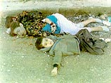 Американцы давят на психику Хусейна, демонстрируя ему сцены пыток Американцы давят на психику Хусейна, демонстрируя ему сцены пыток